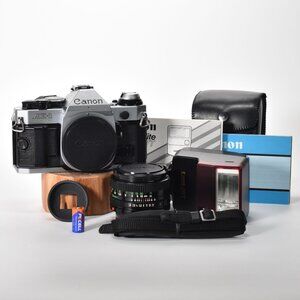 Canon AE-1 Program 35mm SLR Manual Focus Camera 50mm f/1.8 FD Lens Flash MINT